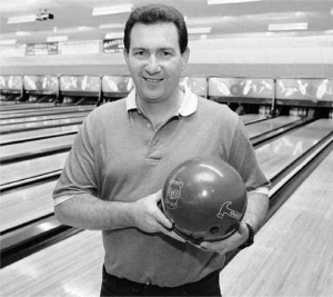 Bob Garzone posing with a bowling ball